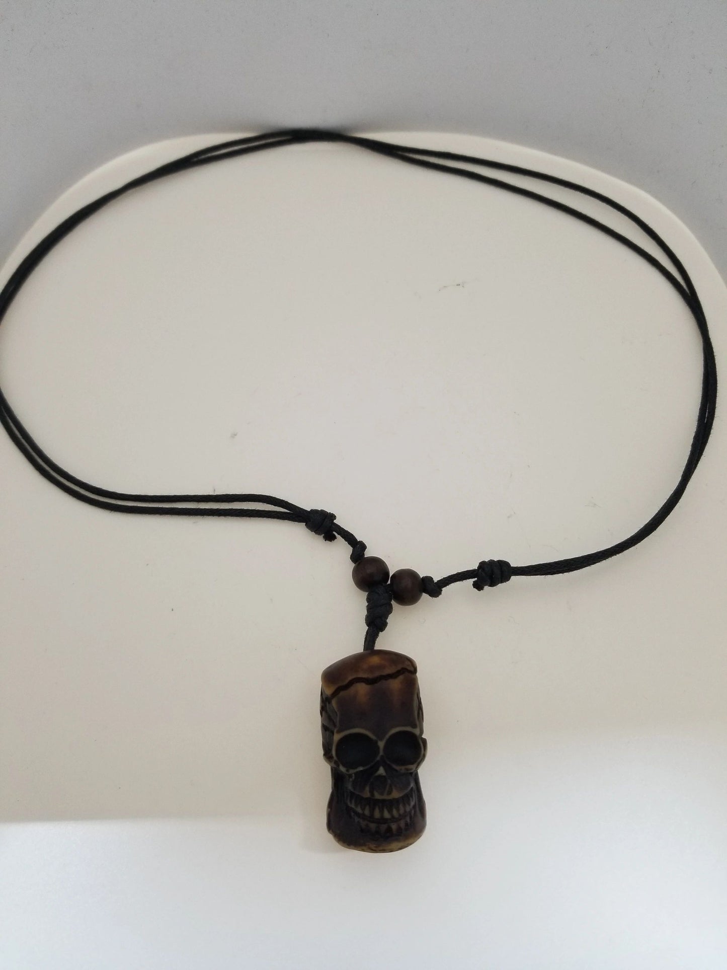 Woodcarving-style Skull Cord Necklace