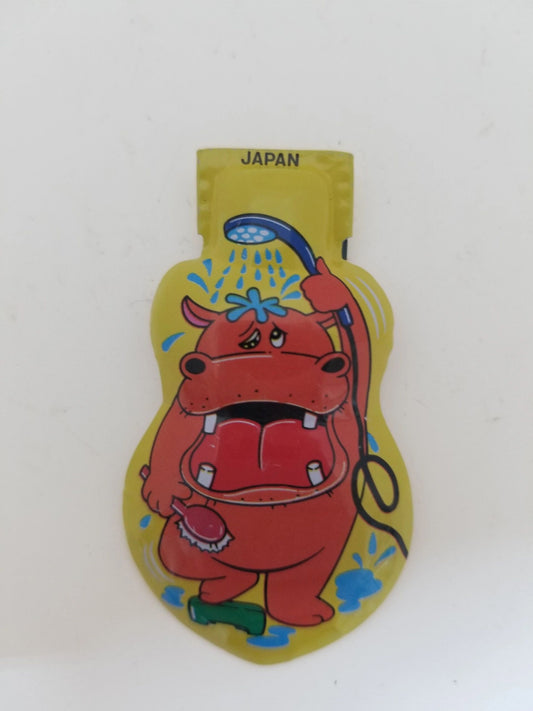 Tin Yellow Clicker Hippo Toy
