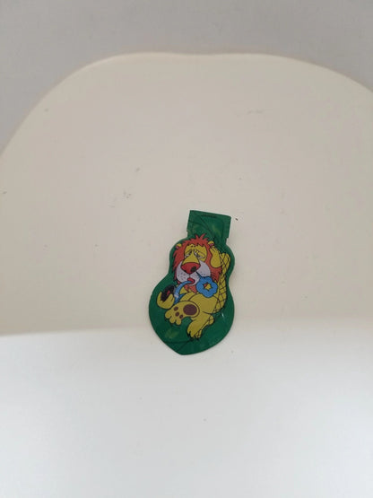 Tin Green Clicker Lion Toy