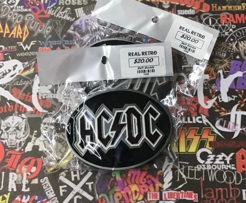 Ac dc outlet belt buckle