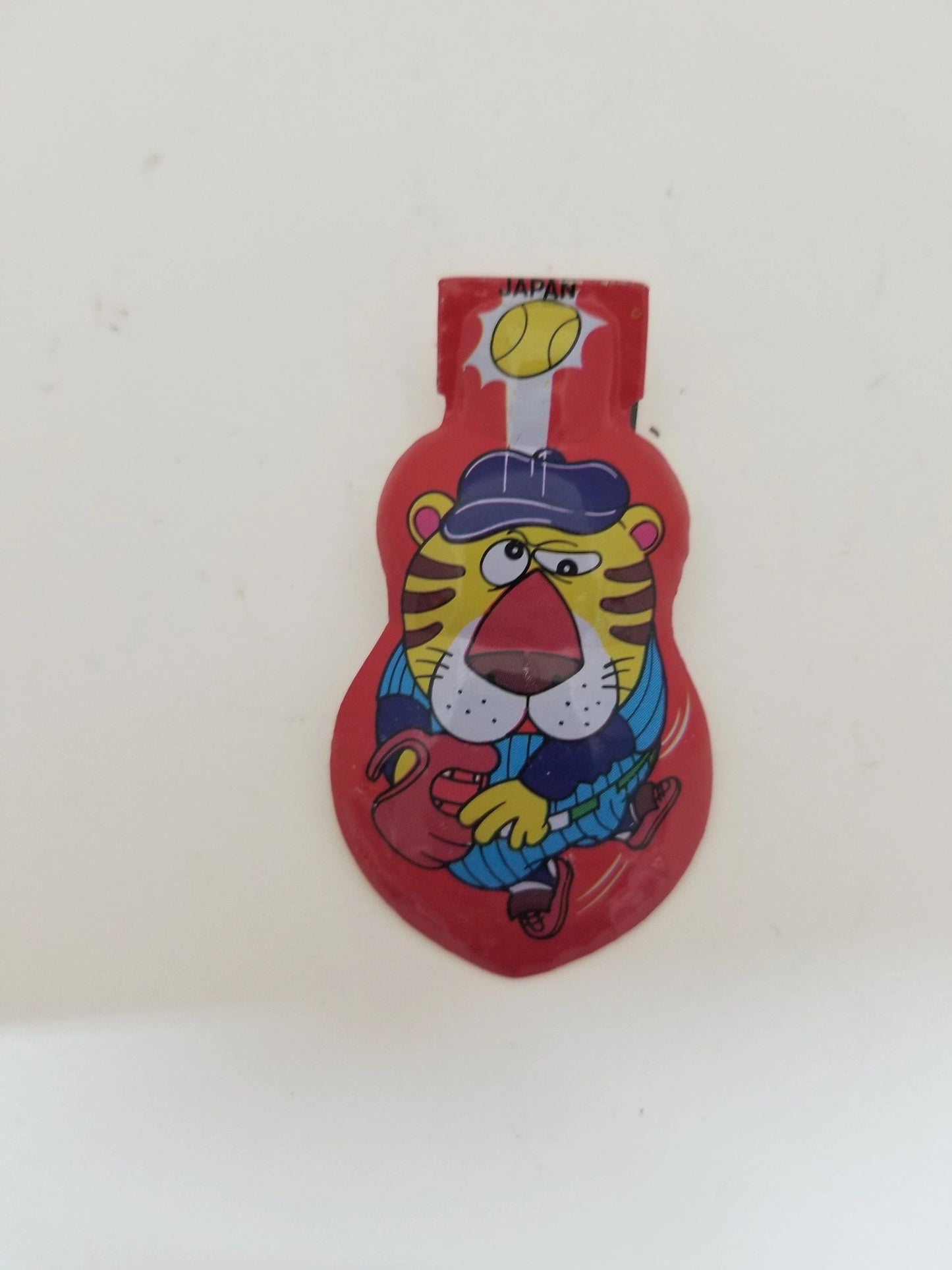 Tin Red Clicker Tiger Toy