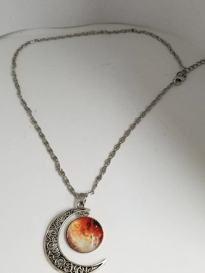 Crescent Moon Pendant And Flame Medallion Necklace